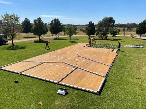 Workers Installing Marquee Floor — Party Supplies in Wagga Wagga, NSW